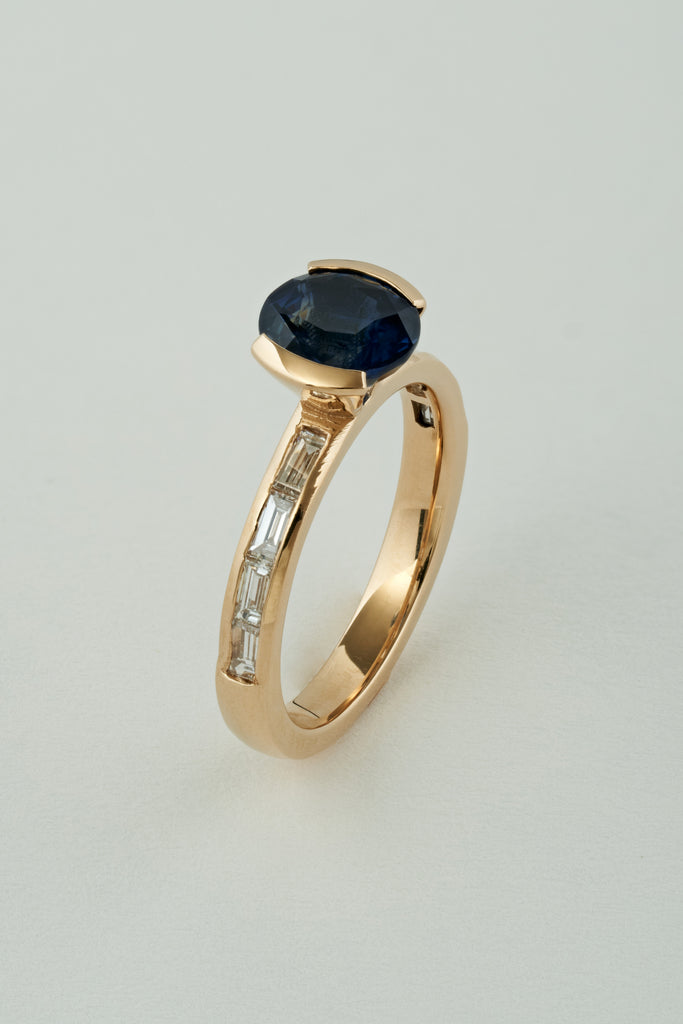 BLUE SAPPHIRE EAST WEST RING